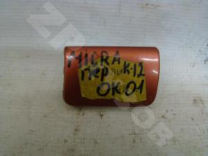Micra K12E 2002 Заглушка буксировочного крюка пер